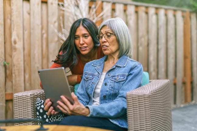two people looking at tablet together.jpg