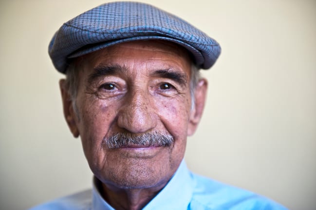 closeup of person in cap facing camera.jpg