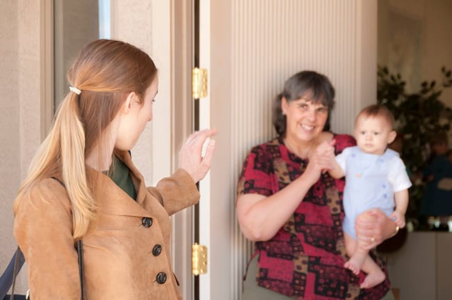 Mother dropping her toddler off with a babysi.width iQpABEx.jpg