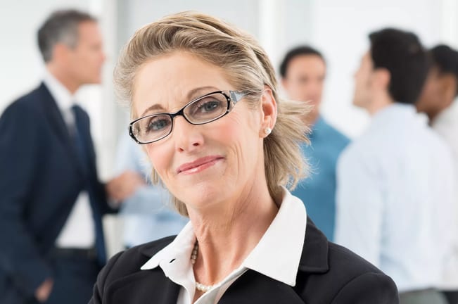 mature woman smiling happy businesswoman.jpg