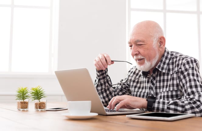 older man at laptop gettyimages