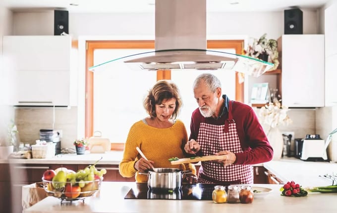 Older couple cooking at home gDjrP.width .jpg