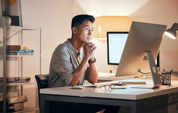 man s serious comp monitor gettyimages .jpg