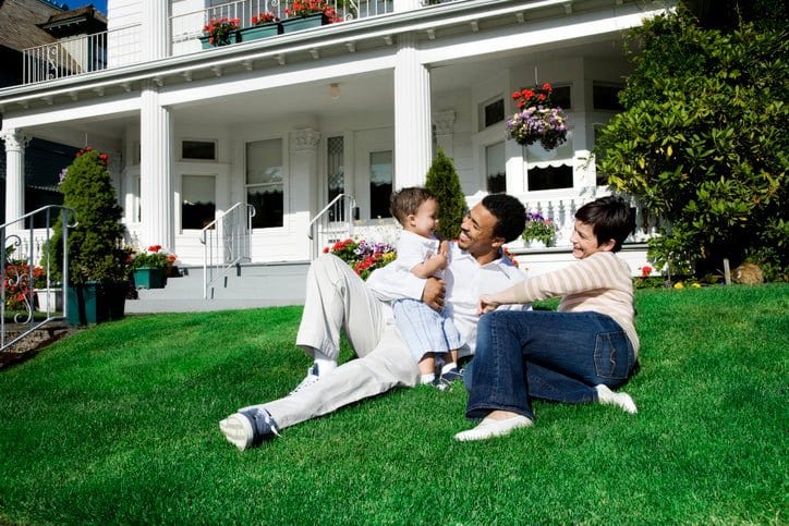 parents and baby in front yard PsaVe.width