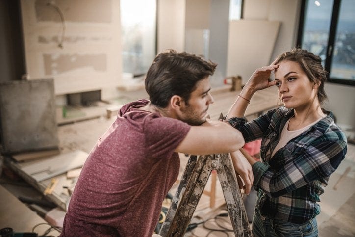 couple stressed doing home renovations.width .jpg