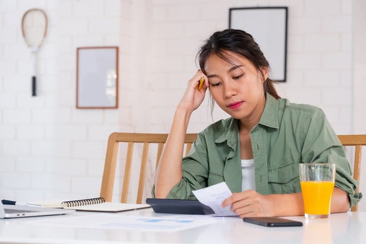 stressed woman with bills.width .jpg