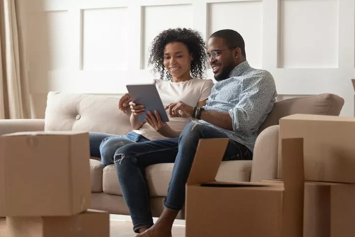 couple with moving boxes.width .jpg
