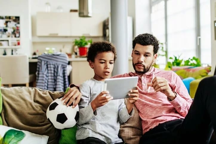 dad and son with tablet Faodsbc.width .jpg