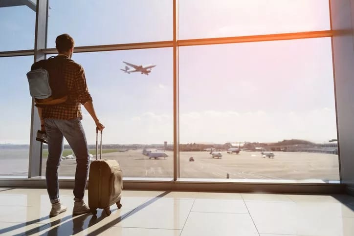 man with suitcase in airport.width .jpg
