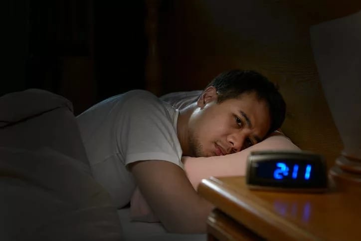 man in bed cant sleep WPiAsg.width .jpg