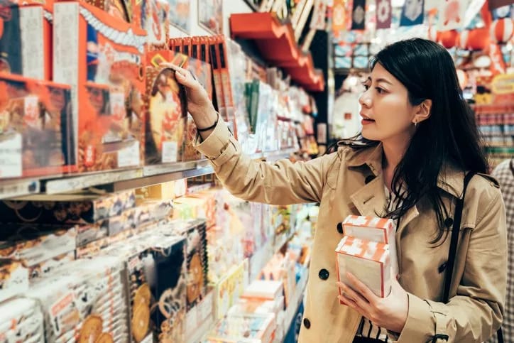 woman buying holiday sweets.width .jpg