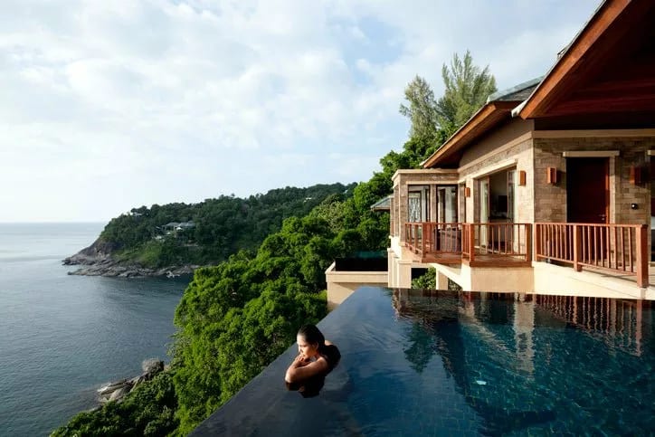 woman in pool luxury hotel gHZAQ.width .jpg