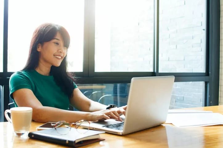 woman on laptop in cafe CDpIRXE.width .jpg