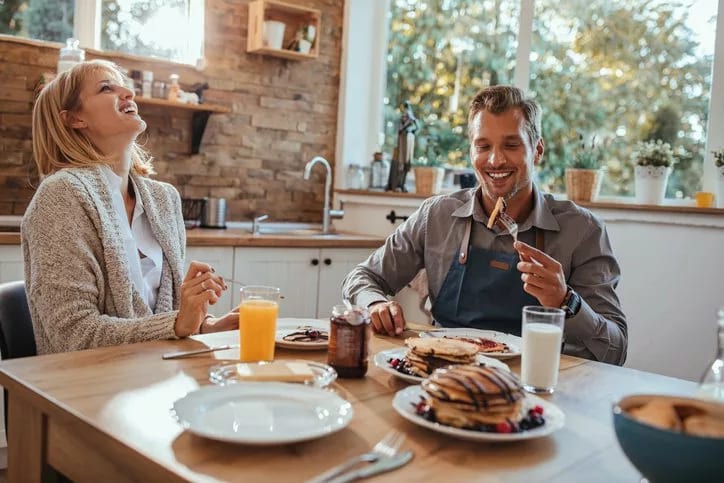 couple eating breakfast at home.width .jpg