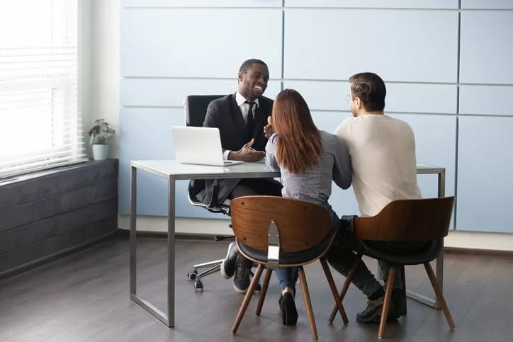couple meeting with bank representative.width bJjKj.jpg