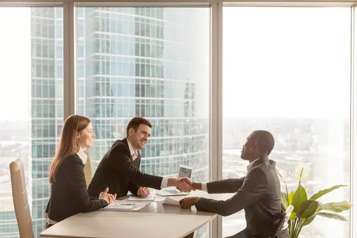 employee shaking hands with bosses RJKQsE.width .jpg