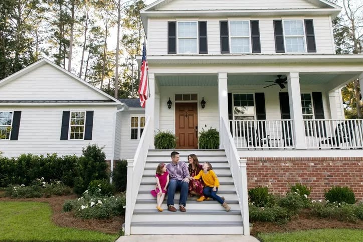 family on home steps.width .jpg