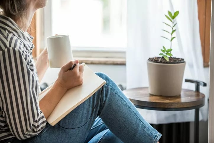 woman with notebook and coffee.width .jpg