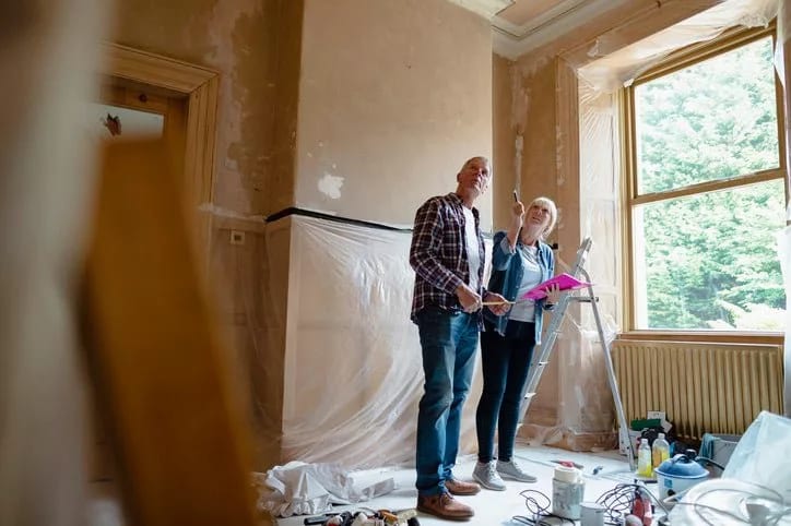 man and woman renovating home MdVRJD.width .jpg