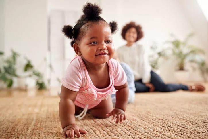 baby crawling with mom.width .jpg