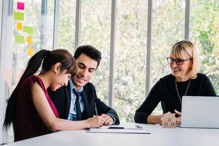 woman signing documents.width .jpg