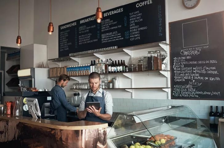 two men working in cafe KDItXBO.width .jpg
