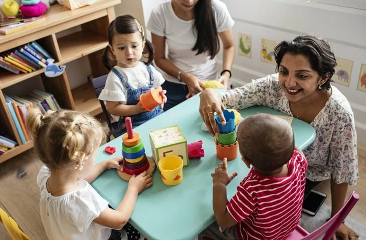 kids and teacher in daycare.width .jpg