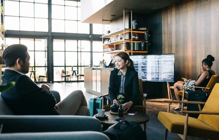 man and woman in airport lounge rQqosD.width .jpg