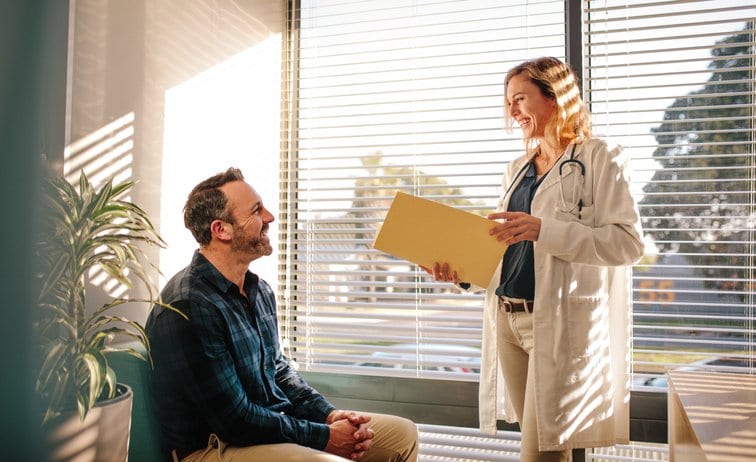 doctor with patient in office.width .jpg