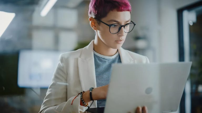 young person staring at laptop.jpg