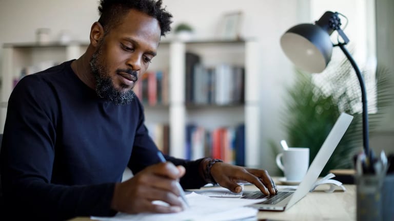 investor reviewing a stock portfolio.jpg
