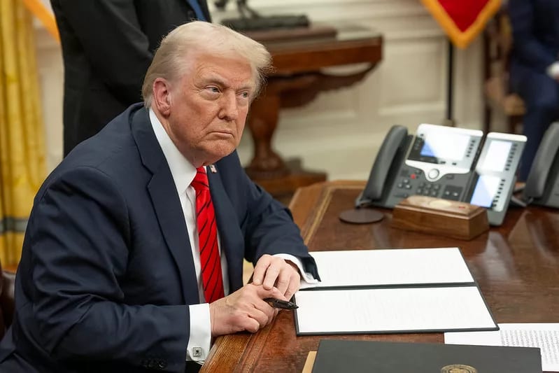 us government work president donald trump signing executive order.jpg