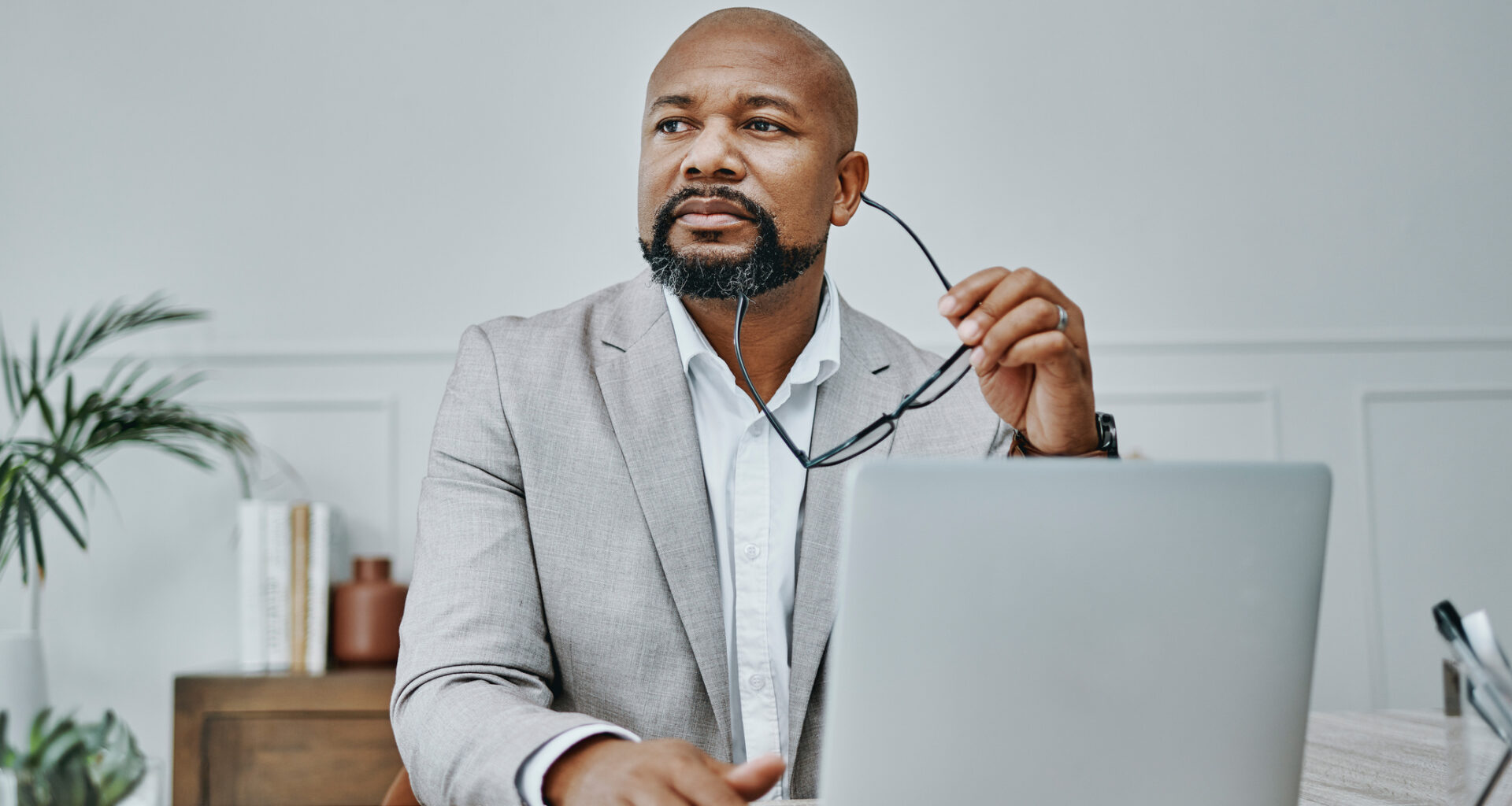 older man laptop in business suit gettyimages