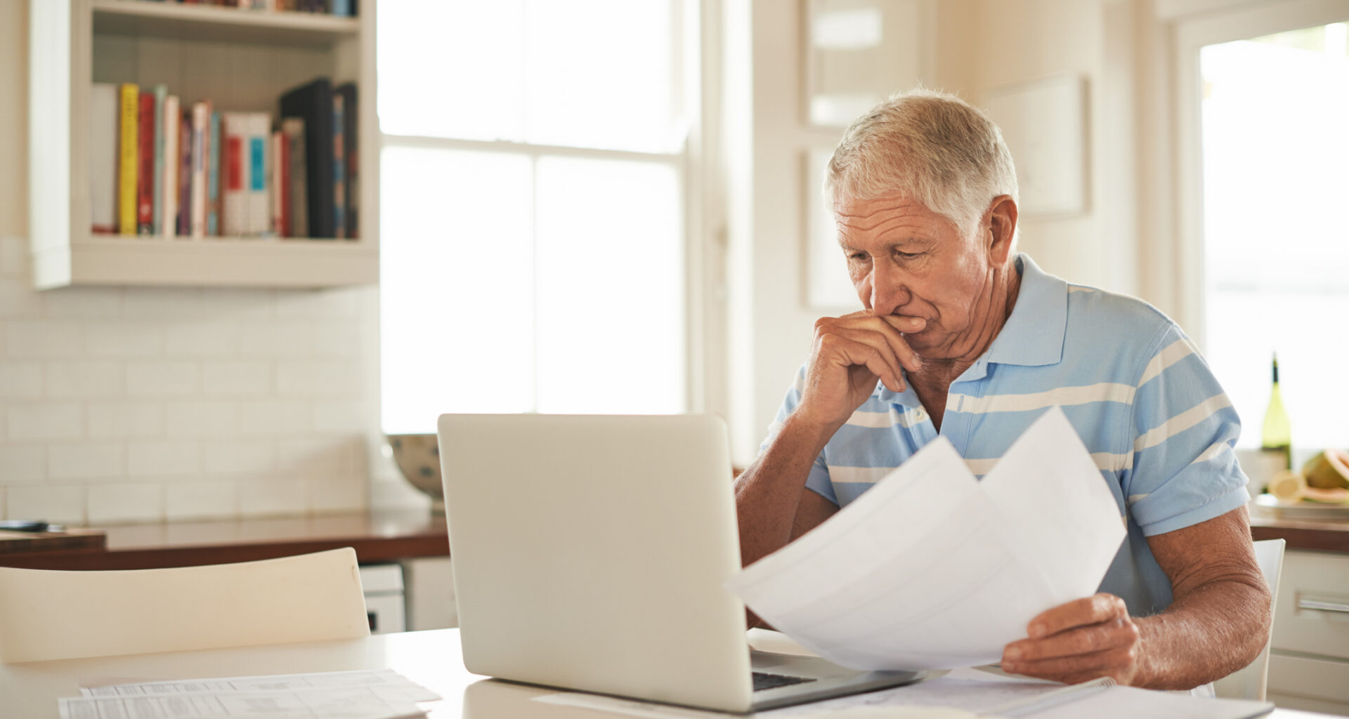 senior man laptop stressed gettyimages