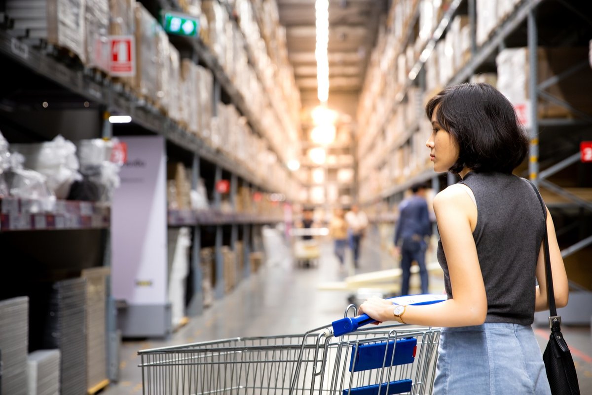 Warehouse club store shopper browsing aisle w.width