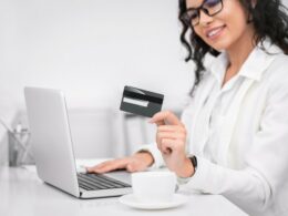 smiling woman with credit card.width .jpg