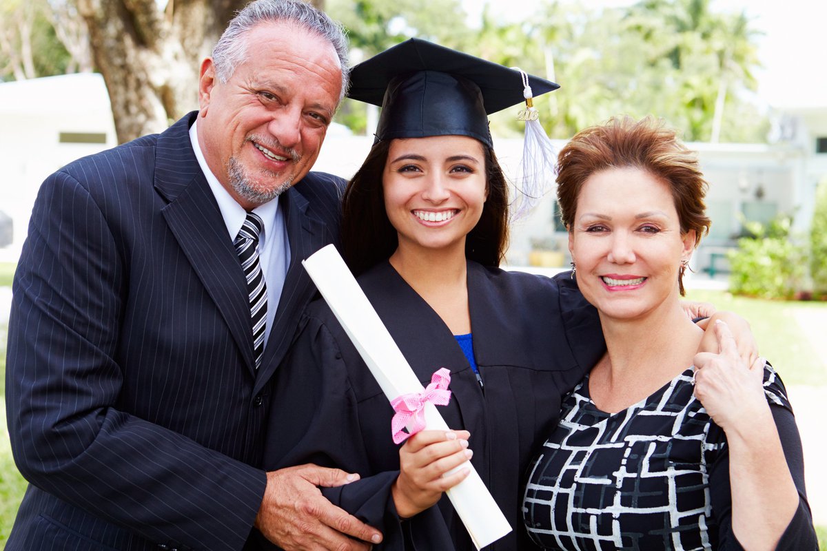 Parents with college student at graduation .width hEWEQM.jpg