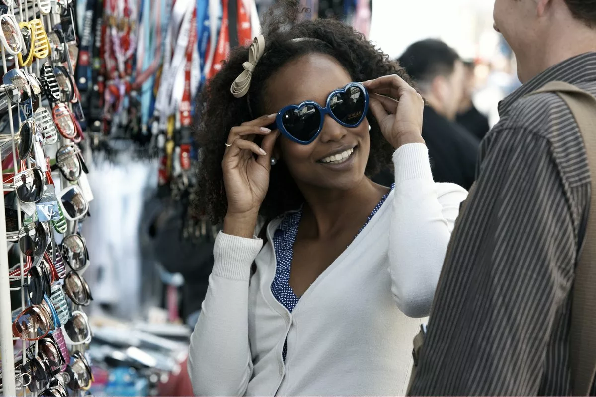 Woman shopping for sunglasses RSnHkOr.width .jpg