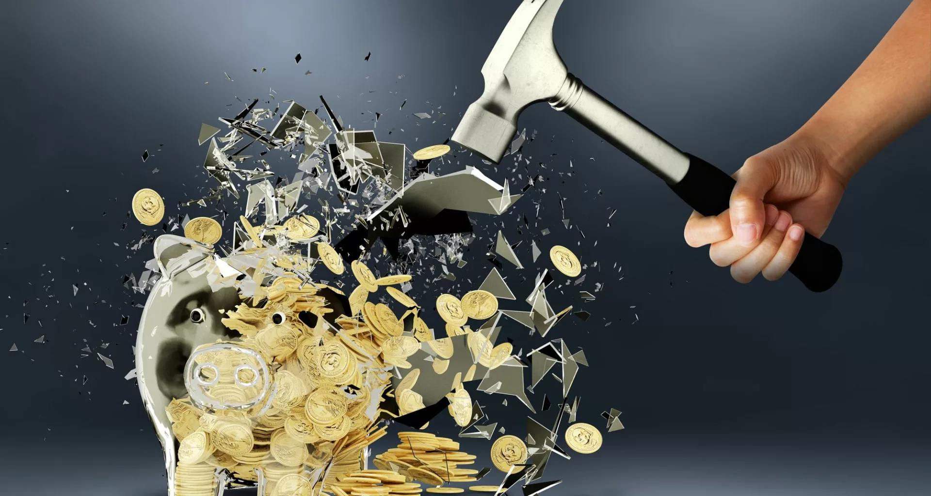getty images person smashing piggy bank with hammer.jpeg