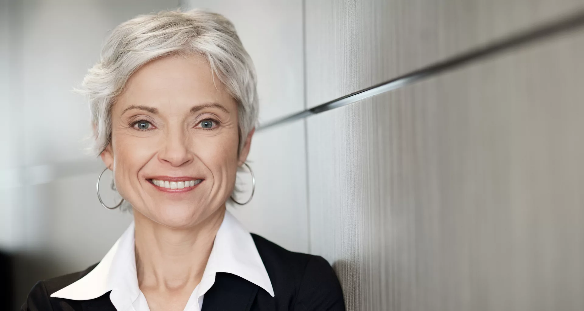 woman older gray hair suit gettyimages .jpg