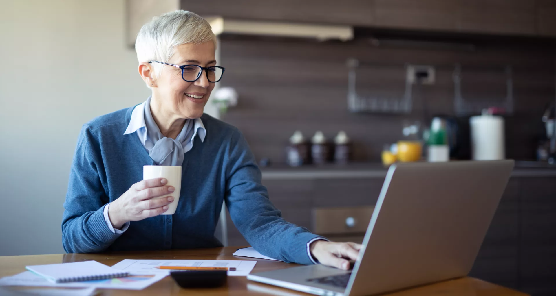 retired woman investing laptop k ira.jpg