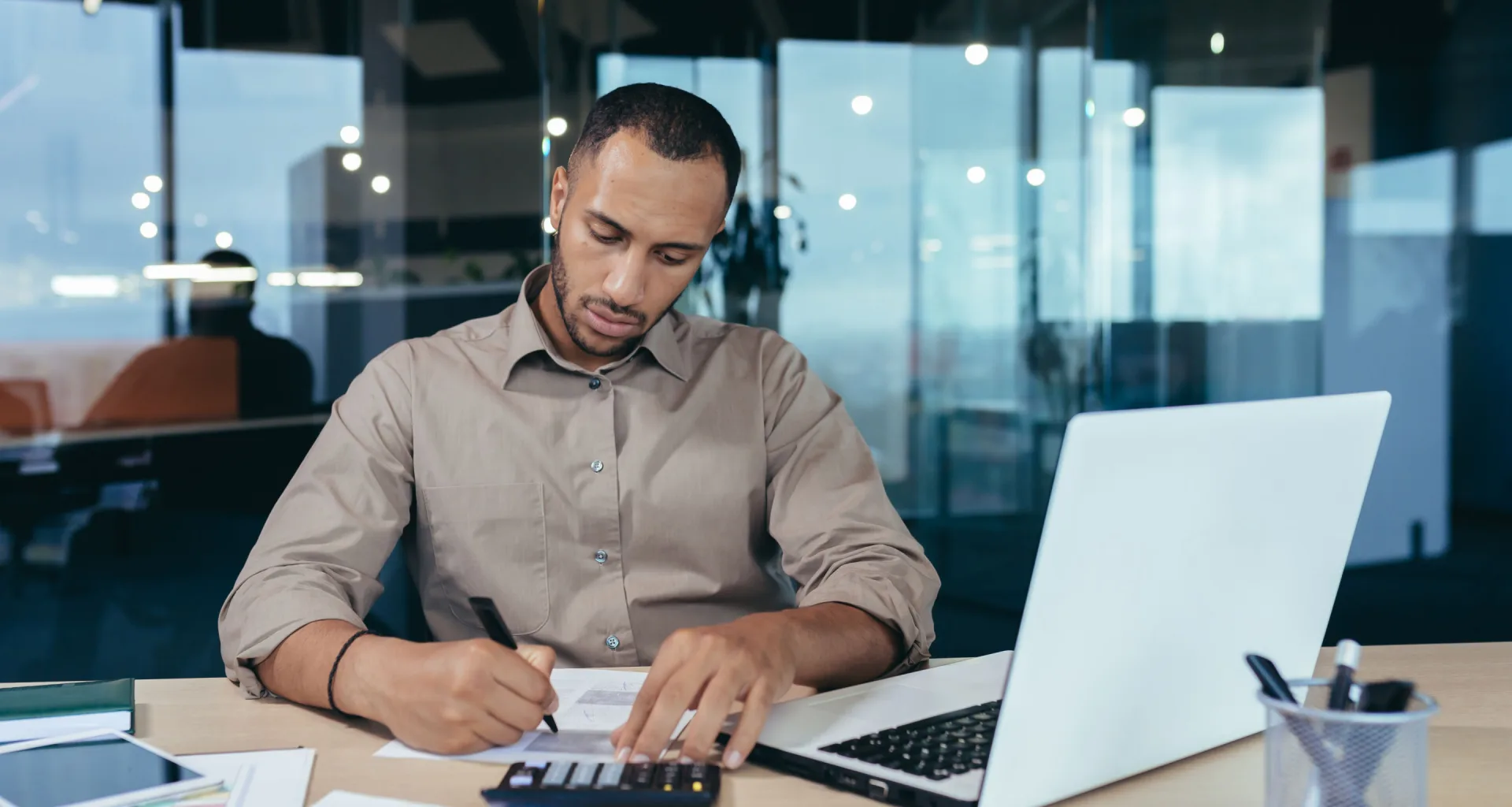 accountant with calculator.jpg